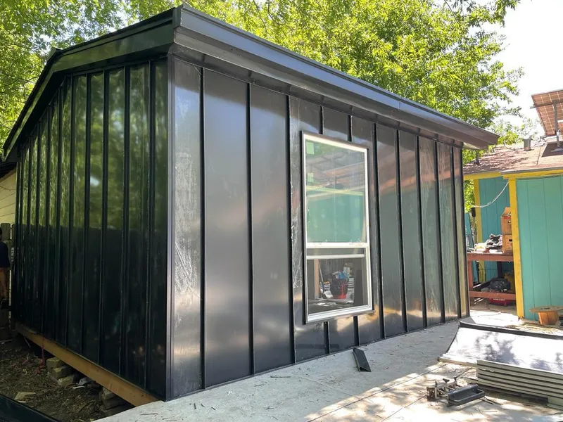 Black standing seam metal wall panels for Roof Inspection in Kenner