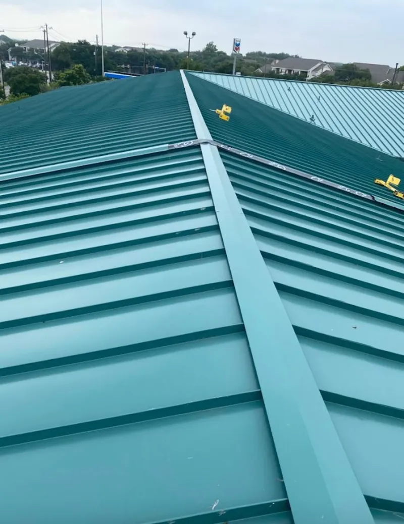 Green commercial metal roof ridge and valley for Metal Roof Repair in Kenner